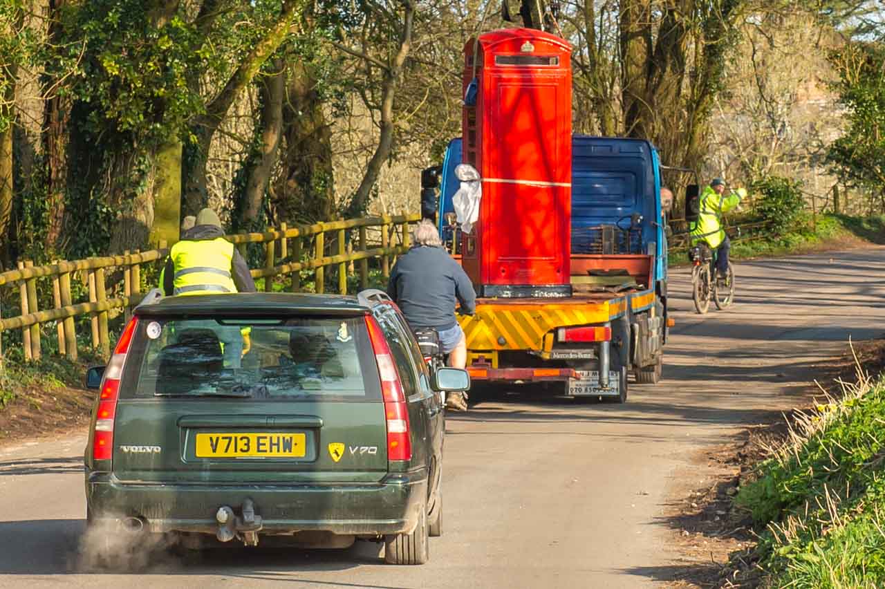 "I think we got us a convoy". The box is slowly moved from Simon's to its new home.